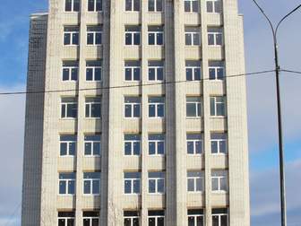 Продается отдельно стоящее 9-ти этажное административно-производственное здание и здание трансформаторной подстанции с земельным участком по адресу: г,  Мурманск, в Мурманске